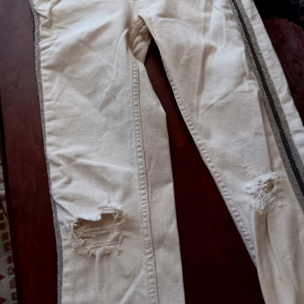 Free people jeans with a racing stripe down the side
